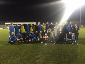NCAFC Squad&Management with members of the 'Down Right Brilliant' group who all had their odd socks on promoting Down Syndrome Awareness.