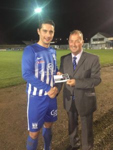 Chairman Martin McLoughlin presents Neil Mullen with his Man of the Match Award sponsored by Hughes BET.