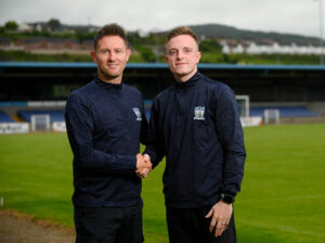 Assistant Manager Ryan Moffatt with new Signing Jordan King