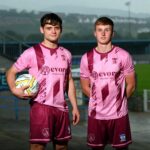 NCAFC first team players Lorcan Forde and Charlie McGrath in the new Evora Cup kit