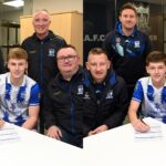 Photographed First team management Stuart King & Ryan Moffatt, players Charlie McGrath & Dylan McKevitt along with Academy Director Damien Hillen and Chairman Gary Wilson.